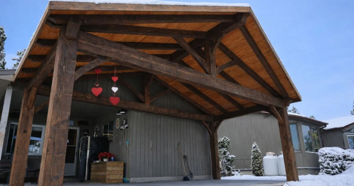 Wooden outdoor pavilion decorated with Valentine’s Day heart accents