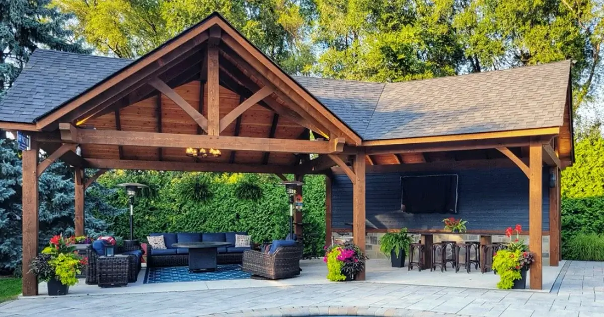 Timber frame backyard pavilion with outdoor seating